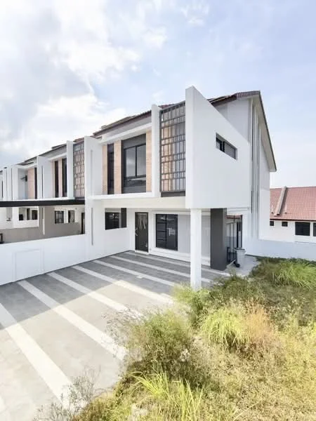 Exterior type: linked terrace house; features: white painted facade, exposed brick accents, flat roof, approximately 2-storey, manicured lawn, stone-paved driveway, large windows, modern architectural design; style: modern.