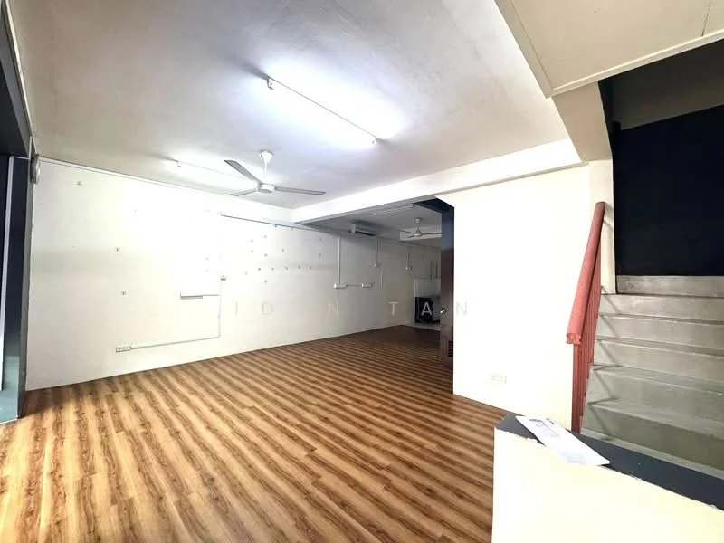Room features: laminate flooring, white painted walls, exposed ceiling, 2 ceiling fans, staircase leading to upper level, large open space, natural light from windows, no visible furniture; style: modern.