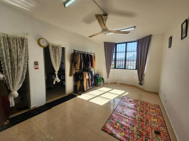 Living features: cream painted walls, tile flooring, 5-blade ceiling fan, floor-to-ceiling windows, sheer curtains, dark curtains, area rug with colorful pattern, wall clock, open shelving, clothing rack, doorway to another room.