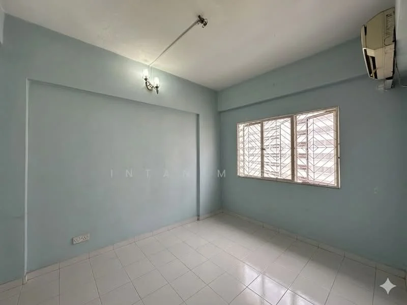 Room features: light blue painted walls, white tiled flooring, 1 wall-mounted split AC, window with metal grille, ceiling light fixture, no visible furniture or decor; style: minimalist.