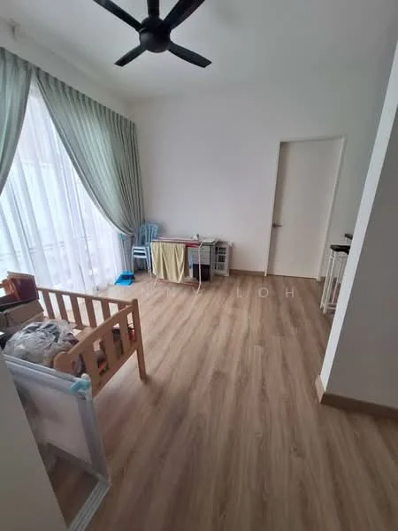 Room features: light wood laminate flooring, white painted walls, floor-to-ceiling windows with sheer curtains, ceiling fan, wooden baby crib, plastic chair, laundry rack, small storage unit, door leading to another room; style: modern.
