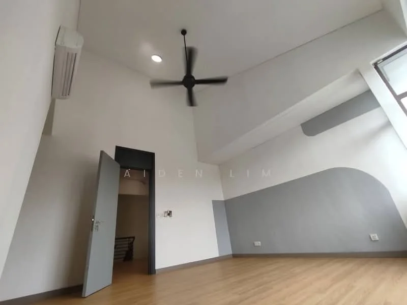 Room features: light wood laminate flooring, white painted walls, grey accent wall, exposed ceiling with sloped design, 5-blade ceiling fan, wall-mounted split AC, door leading to another room, large window for natural light; style: modern.