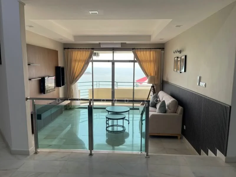Living features: floor-to-ceiling windows, beige fabric sofa, glass coffee table, TV mounted on wall, light-colored wall with wood paneling, marble flooring, recessed downlights, sheer curtains, balcony with sea view, decorative wall art; style: modern; view: sea.