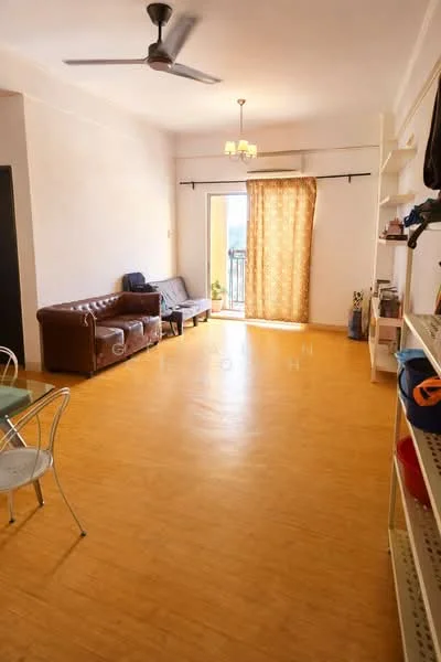 Living features: laminate flooring, cream painted walls, ceiling fan, chandelier, sofa in brown leather, armchair in dark fabric, curtains with floral pattern, open shelving unit, glass dining table with metal chairs, balcony door, decorative items on shelves; style: modern; view: city.