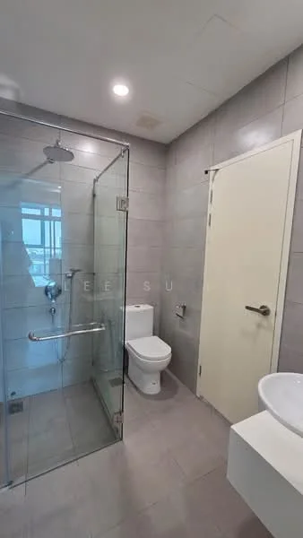 Bathroom features: glass shower enclosure, rain shower head, handheld shower, white toilet, single-sink vanity with white cabinet, round basin, grey tiled walls, light grey floor tiles, mirror above sink, chrome faucet, towel rail, wall-mounted soap dispenser; style: modern.