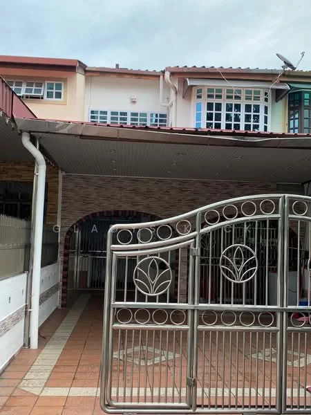 Exterior type: linked terrace house; features: metal gate with decorative design, brick facade, tiled flooring, overhang roof, multiple windows, front porch area, exposed brick wall, satellite dish on roof; style: modern.