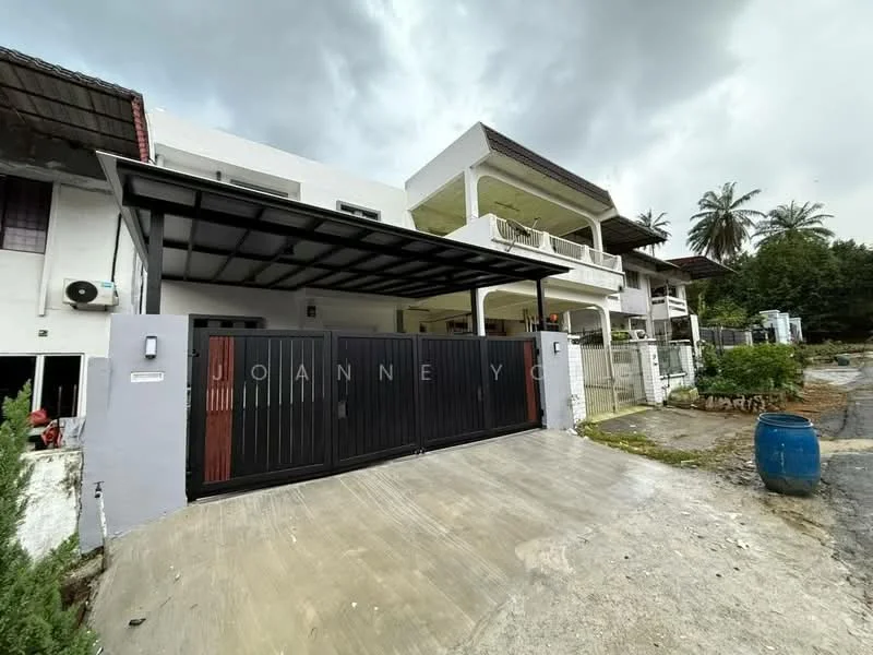 Exterior type: linked terrace house; features: black metal gate, covered car porch, white painted facade, two-storey structure, balconies on upper level, paved driveway, manicured landscaping, palm trees, stormy sky, adjacent to green area; style: modern.
