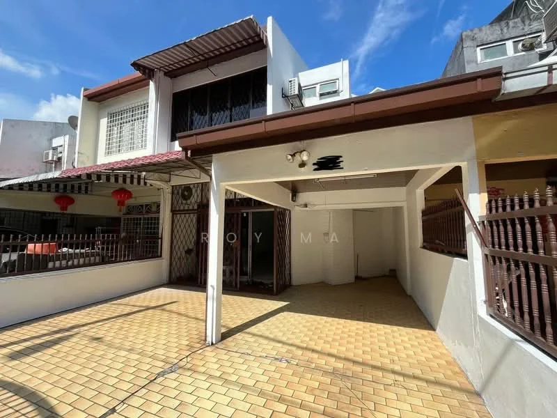 Exterior type: linked terrace house; features: paved outdoor area, covered porch, metal grilles on windows, red lanterns hanging, white painted walls, sliding glass door, roof overhang, exposed brick wall, outdoor lighting fixtures; style: modern.