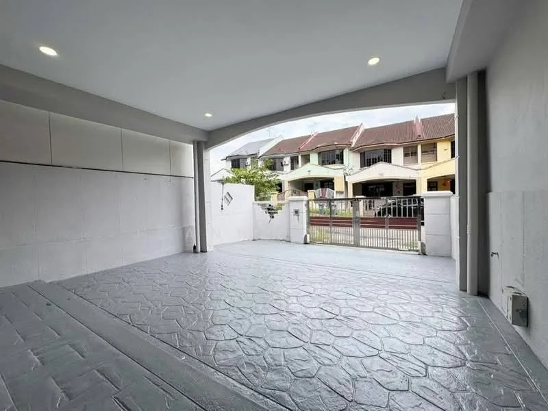 Exterior type: linked terrace house; features: grey stamped concrete flooring, white painted walls, arched entrance, gated entry, surrounded by residential houses, outdoor space with natural light; style: modern.