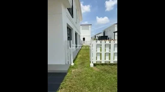 Exterior type: detached bungalow; features: white painted facade, two-storey building, manicured lawn, fenced yard with white picket fence, slate tile pathway, clear blue sky, surrounded by other residential buildings; style: modern.