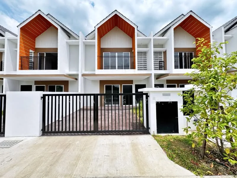 Exterior type: linked terrace house; features: white painted facade, orange accent roof, balconies with glass railings, manicured lawn, paved driveway, gated entrance, multiple storeys, modern architectural design; style: modern.