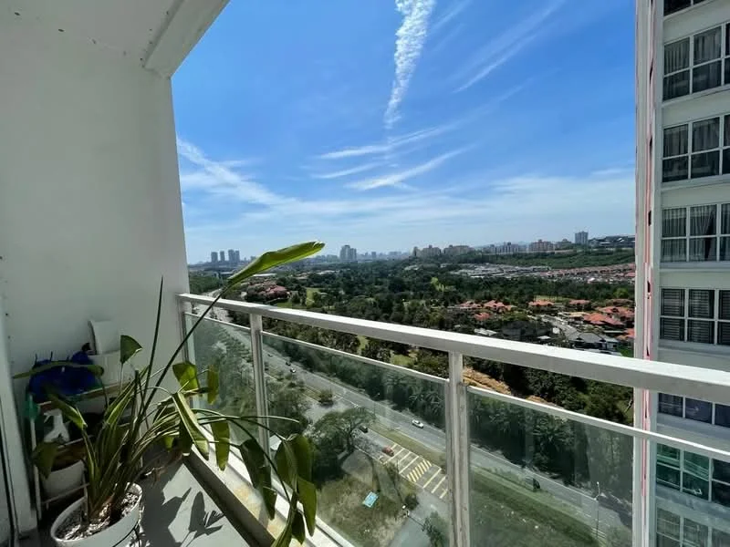 Room features: glass balcony railing, concrete flooring, potted plant, city skyline view, green landscape view, blue sky, clouds; view: city.