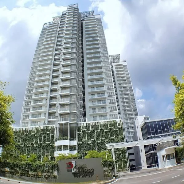 Exterior type: high-rise condominium; features: glass curtain wall, white painted facade, recessed balconies, vertical fins, manicured landscaping, feature lighting at night, surrounded by mature greenery, double-volume main lobby, porte cochère drop-off; style: modern.
