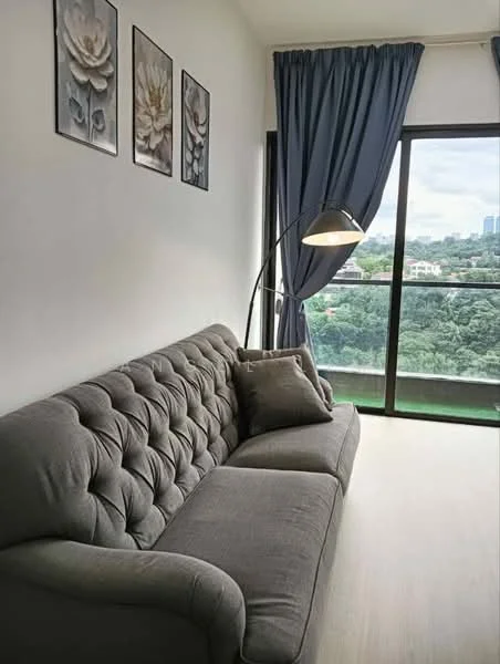 Living features: grey tufted fabric sofa, decorative throw pillow, floor lamp with curved arm, framed floral artwork on walls, floor-to-ceiling windows, blue curtains, wooden flooring, green view from window; style: modern; view: garden.