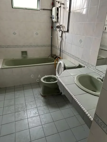 Bathroom features: bathtub, toilet, single-sink vanity with green basin, mirror, white tiled walls, grey tiled flooring, showerhead, water heater, faucet.