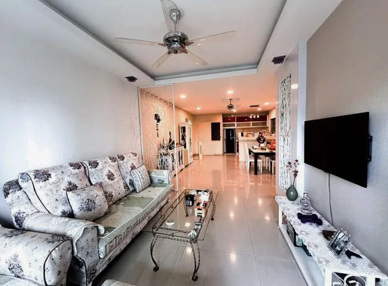 Living features: 3-seater fabric sofa with floral pattern, glass coffee table, wall-mounted TV, recessed ceiling lights, ceiling fan with light, cream painted walls, glossy tile flooring, decorative wall panel, open layout to kitchen, decorative vases, TV console, area rug; style: modern. Kitchen features: kitchen island, stainless-steel appliances, open shelving, wood cabinetry, recessed lighting; style: modern.