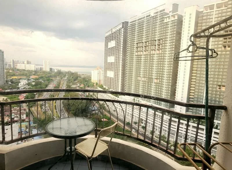 Room features: balcony with railing, round glass table, two metal chairs, city skyline view, high-rise buildings in background, greenery visible below, roadway visible below, water body in distance; view: city.
