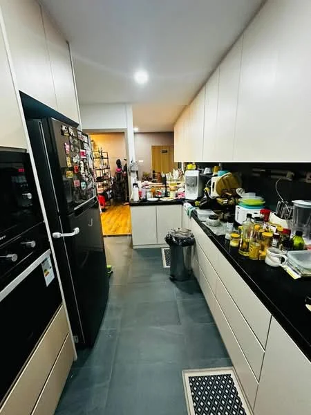 Kitchen features: black granite countertop, light beige cabinetry, built-in oven, freestanding fridge, stainless-steel sink, chrome pull-down faucet, tile flooring, recessed downlights, open shelving, kitchen appliances visible, garbage bin, various kitchen utensils and containers; style: modern.
