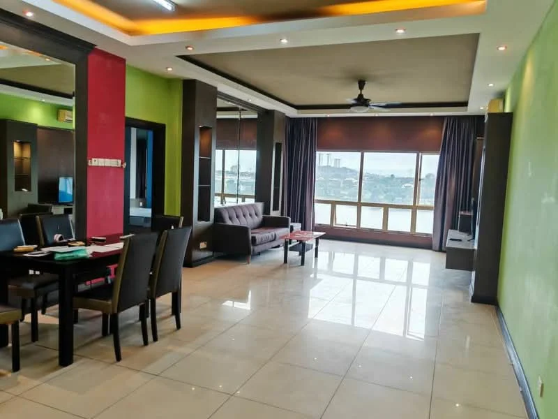 Living features: floor-to-ceiling windows, grey fabric sofa, 4-seater dining table, dark wood dining chairs, white tiled flooring, green accent wall, red accent wall, recessed downlights, ceiling fan, curtains, city view; style: modern; view: city.