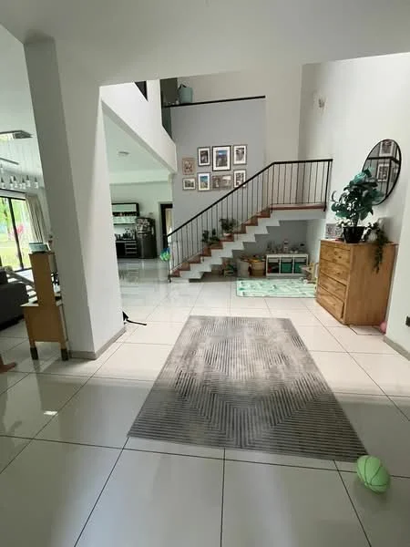 Room features: white painted walls, high ceiling, large windows, tile flooring, staircase with wooden steps and metal railing, decorative wall art, area rug with geometric pattern, wooden sideboard, greenery in pots, open layout, natural light; style: modern; view: garden.