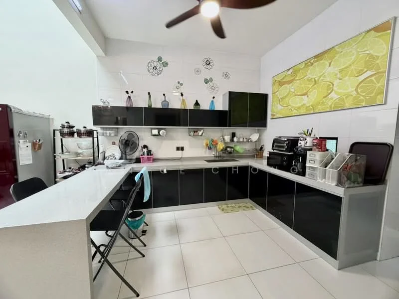 Kitchen features: black cabinetry, white countertop, stainless-steel appliances, built-in oven, freestanding fridge, kitchen island, wall-mounted fan, decorative wall art with fruit design, tile backsplash, ceramic tile flooring, open shelving, kitchen utensils on display, folding chairs, sink with faucet; style: modern.