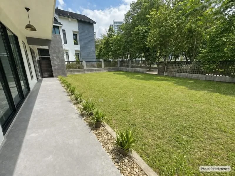 Exterior type: detached bungalow; features: manicured lawn, stone-paved walkway, surrounded by mature greenery, concrete patio, large grass area, fenced perimeter, two-storey building in background, clear blue sky; style: modern.