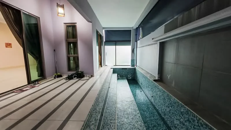 Room features: indoor swimming pool, mosaic tile flooring, glass sliding doors, large windows, grey wall cladding, purple painted walls, recessed lighting, striped flooring, water feature, open layout; style: modern; view: garden.