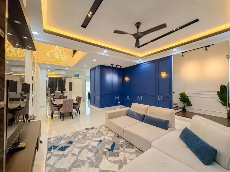 Living features: L-shape sectional sofa in cream, area rug with geometric pattern, wall-mounted TV, ceiling fan with integrated LED light, recessed downlights, feature wall with blue paneling, white painted walls, marble tile flooring, chandelier, decorative wall molding; style: modern.
