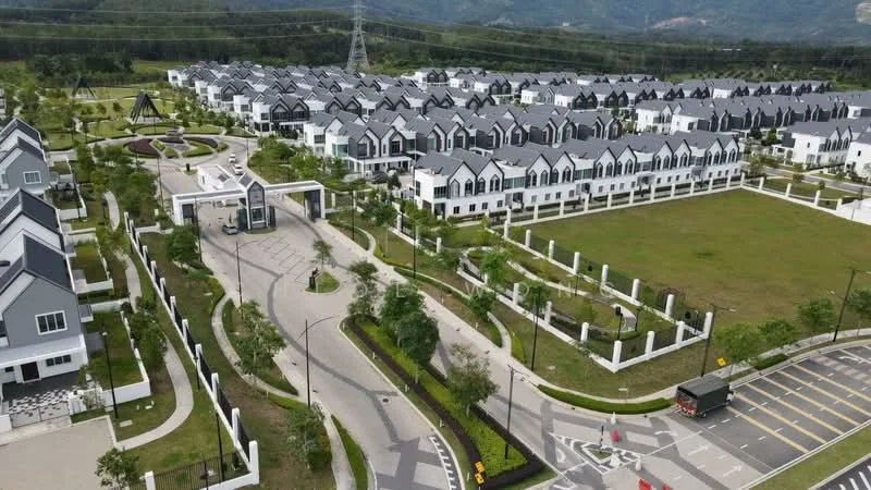 Exterior type: linked terrace house; features: manicured lawn, tropical landscaping, paved walkways, multiple storey houses, modern architectural design, surrounded by greenery, gated community entrance, street lighting, parking spaces, playground area, open green spaces; style: modern.