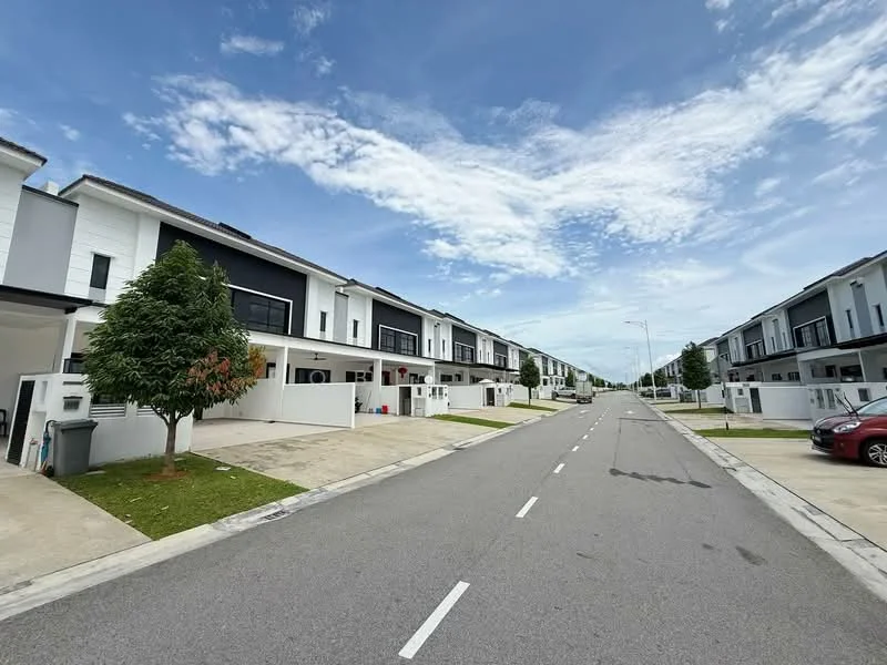 Exterior type: linked terrace house; features: white painted facade, black accent panels, two-storey structure, manicured lawn, paved driveway, street view, surrounded by greenery, modern architectural design; style: modern.