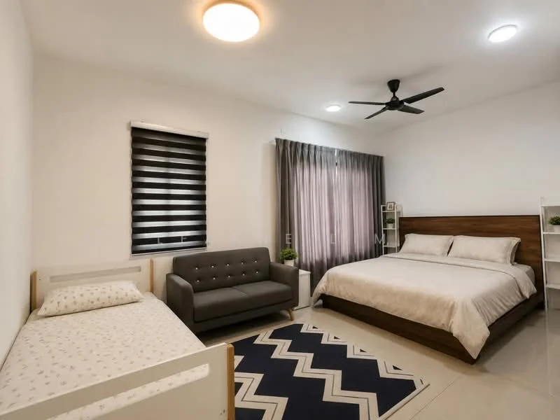Bedroom features: queen-size bed with wooden headboard, single bed with white bedding, 3-seater fabric sofa in grey, area rug with geometric pattern, blackout roller blinds, curtains, ceiling fan, recessed LED downlights, white painted walls, tile flooring; style: modern.