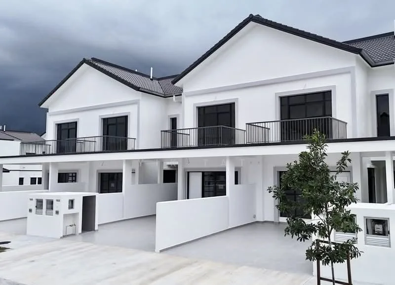 Exterior type: linked terrace house; features: white painted facade, flat roof, double-storey, recessed balconies, black framed windows, manicured landscaping, paved driveway, covered porch area; style: modern.