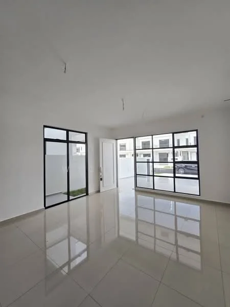 Room features: white painted walls, glossy ceramic tile flooring, large floor-to-ceiling windows, black framed windows, single main entrance door, recessed ceiling lights, open layout, natural light from multiple windows; style: modern; view: garden.