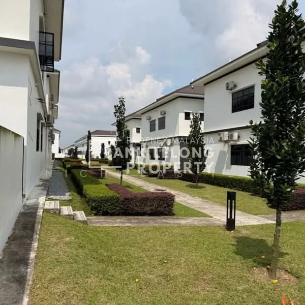 Exterior type: low-rise apartment block; features: manicured lawn, landscaped garden, stone-paved walkway, decorative shrubs, trees lining the pathway, multiple low-rise buildings, air conditioning units visible on buildings; style: modern.