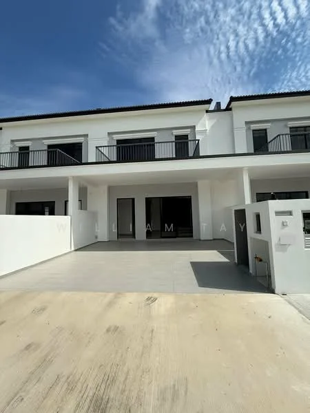 Exterior type: linked terrace house; features: white painted facade, flat roof, two-storey building, balconies on upper level, large glass sliding doors, paved driveway, manicured lawn, concrete wall, outdoor space in front, clear blue sky, textured wall finish; style: modern.