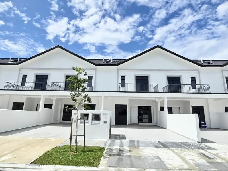 Exterior type: linked terrace house; features: white painted facade, flat roof, two-storey building, recessed balconies, black framed windows, manicured lawn, paved driveway, landscaped garden, clear blue sky, surrounded by greenery; style: modern.