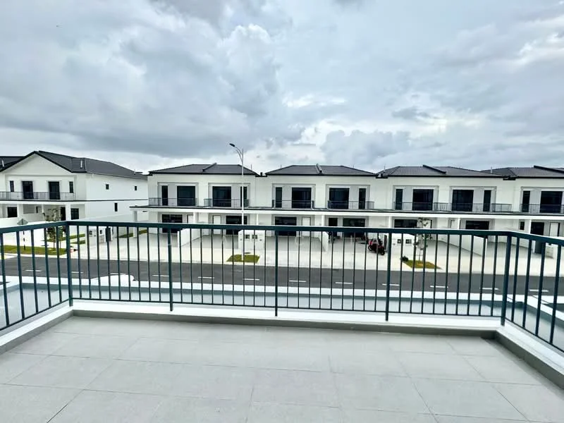 Balcony features: metal railing, grey tiled flooring, open view, surrounding residential buildings, cloudy sky, street view; style: modern; view: street.