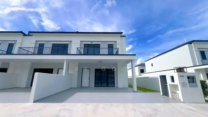 Exterior type: linked terrace house; features: white painted facade, flat roof, two-storey structure, balconies with black railings, concrete driveway, manicured lawn, large windows, main entrance door, side gate, surrounding greenery; style: modern.