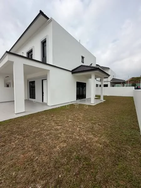 Exterior type: detached bungalow; features: white painted facade, flat roof, two-storey structure, manicured lawn, paved walkway, large windows, covered porch, surrounded by fencing; style: modern.