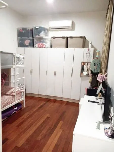 Bedroom features: bunk bed with pink bedding, white built-in wardrobe with sliding doors, wooden flooring, wall-mounted air conditioning unit, white dresser, storage boxes on top of wardrobe, curtains, TV on dresser; style: modern.