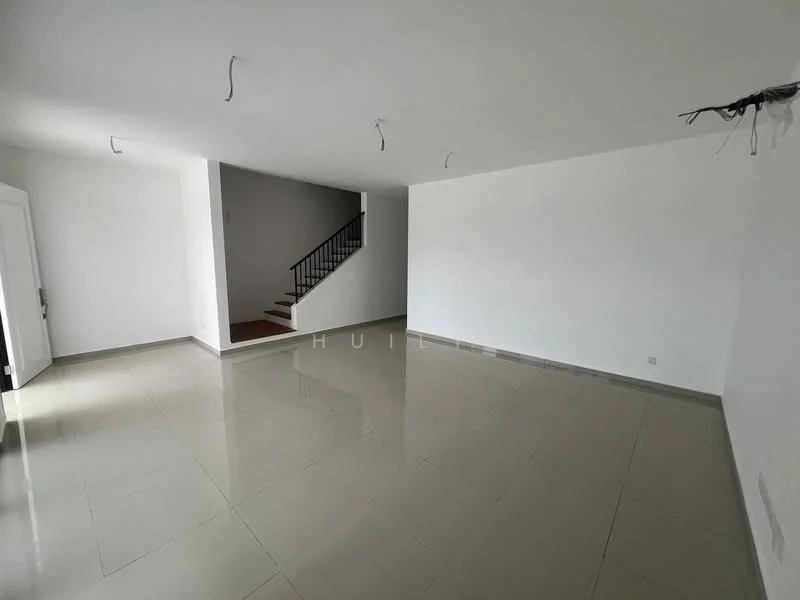 Room features: white painted walls, glossy ceramic tile flooring, staircase with black railing, no visible ceiling fixtures, large open space, natural light from windows, neutral color scheme, no visible furniture or decor; style: minimalist.