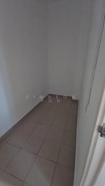 Room features: white painted walls, tile flooring, corner room, single door, no visible windows.