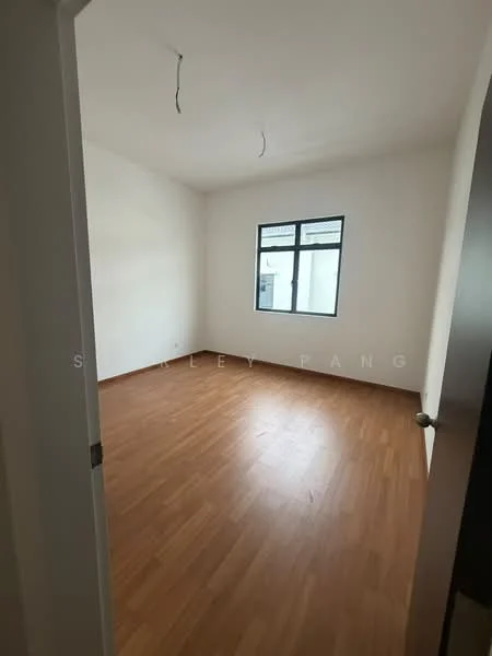 Room features: light wood flooring, white painted walls, one window, two ceiling light fixtures, no visible furniture.