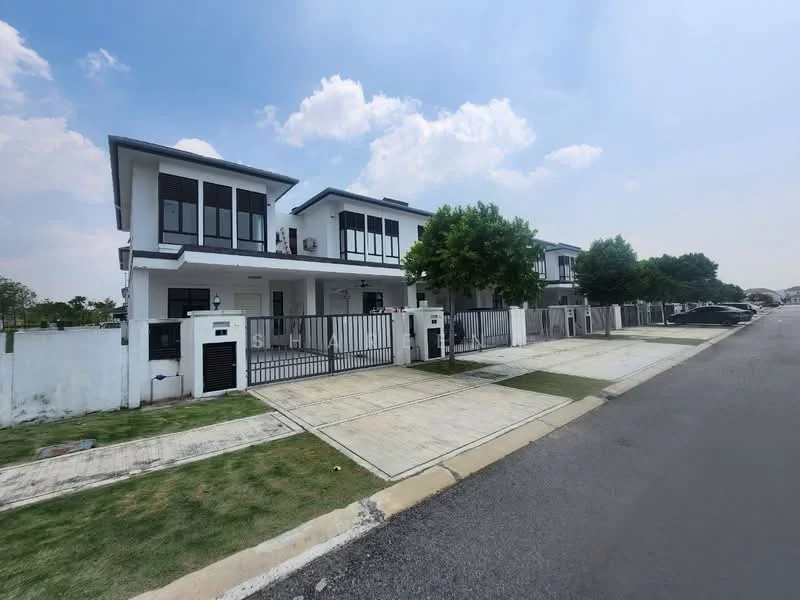 Exterior type: linked terrace house; features: white painted facade, black framed windows, flat roof, manicured lawn, paved driveway, fenced front yard, two-storey structure, surrounded by greenery, street view, adjacent to road; style: modern.
