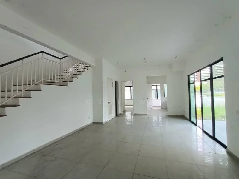 Room features: white painted walls, grey tiled flooring, large floor-to-ceiling windows, sliding glass door, staircase with white railing, recessed ceiling lights, open layout, natural light from windows, view of outdoor space; style: modern; view: garden.