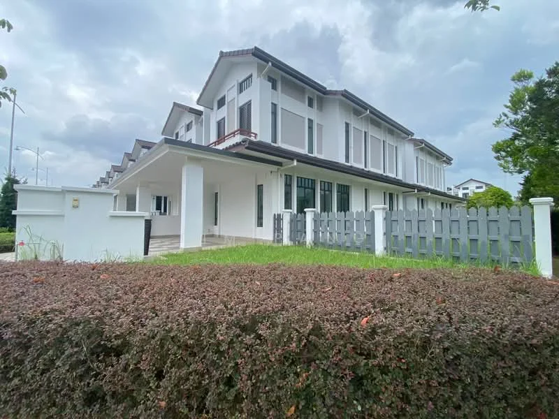 Exterior type: linked terrace house; features: white painted facade, flat roof, double-storey, manicured lawn, surrounded by greenery, grey wooden fence, paved walkway, large windows, front porch, driveway; style: modern.