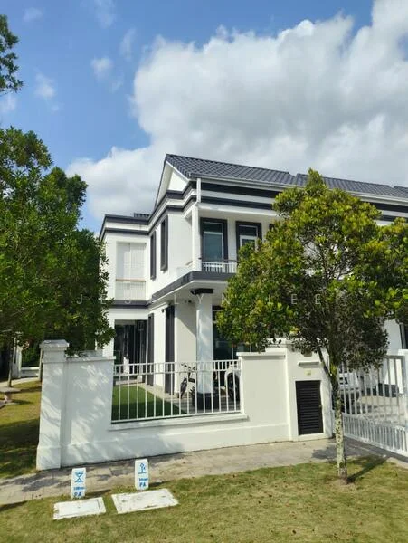 Exterior type: detached bungalow; features: white painted facade, flat roof, two-storey building, manicured lawn, mature trees, fenced perimeter, paved walkway, balconies on upper floor, large windows, garage area, outdoor lighting; style: modern.