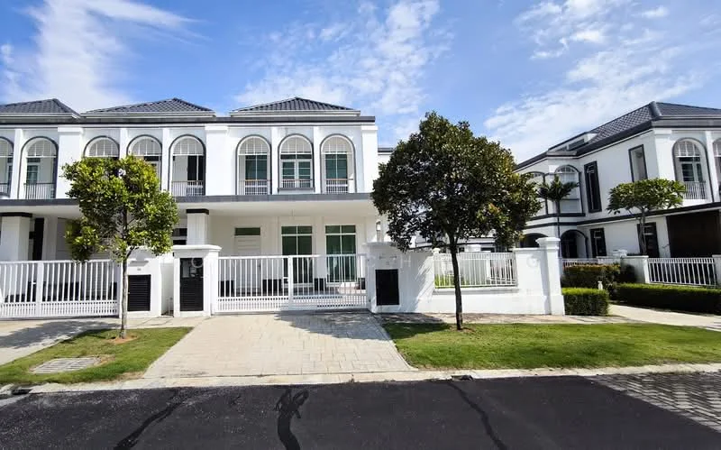 Exterior type: linked terrace house; features: white painted facade, arched windows, flat roof, manicured lawn, paved walkway, fence with gate, landscaped garden, two-storey structure, driveway with interlocking pavers; style: modern.