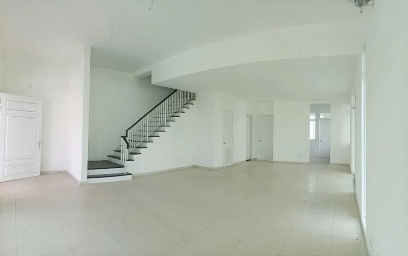 Room features: white painted walls, tile flooring, staircase with black steps and white railing, multiple doorways, large windows for natural light, high ceiling, open layout, no visible furniture or decor; style: minimalist.