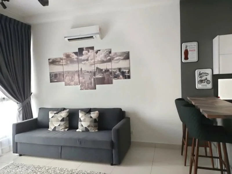 Living features: grey fabric sofa, two decorative cushions, wall-mounted air conditioning unit, framed artwork on wall, light-coloured tiled flooring, sheer curtains, dark accent wall, wooden dining table, high-backed bar stools; style: modern.